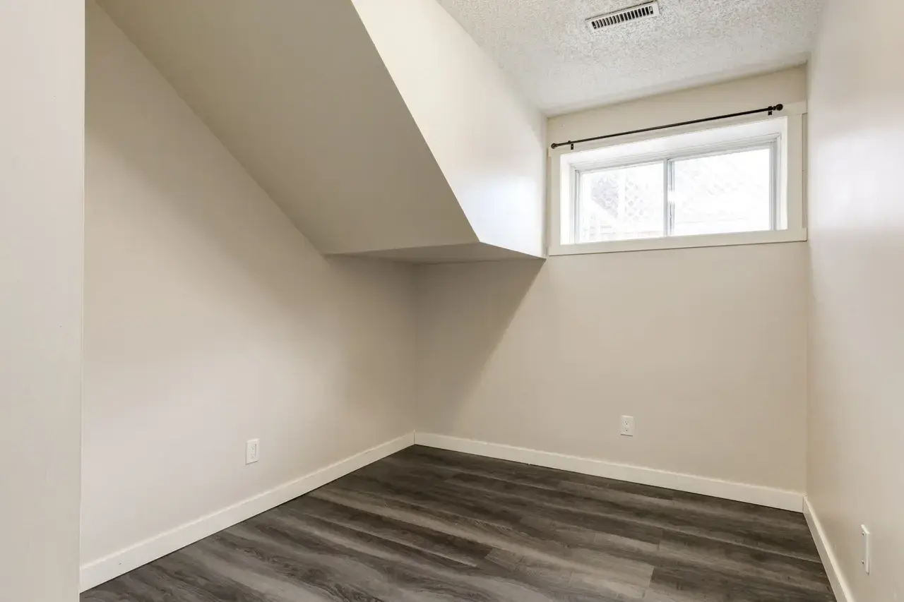 Comfortable and well-sized bedroom at Spruce View Apartments in Camrose.