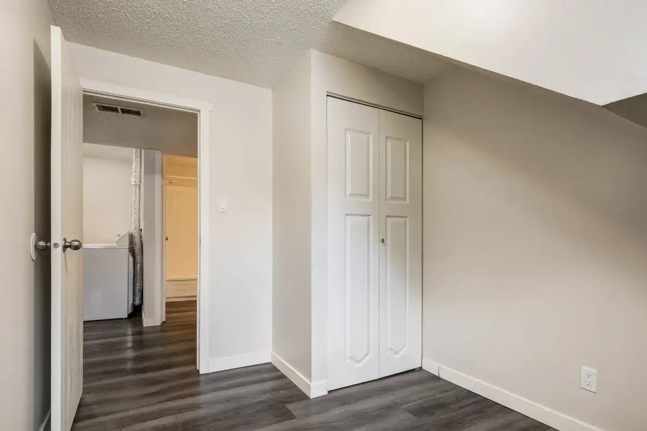 Open bedroom space with flexible layout at Spruce View Apartments in Camrose.