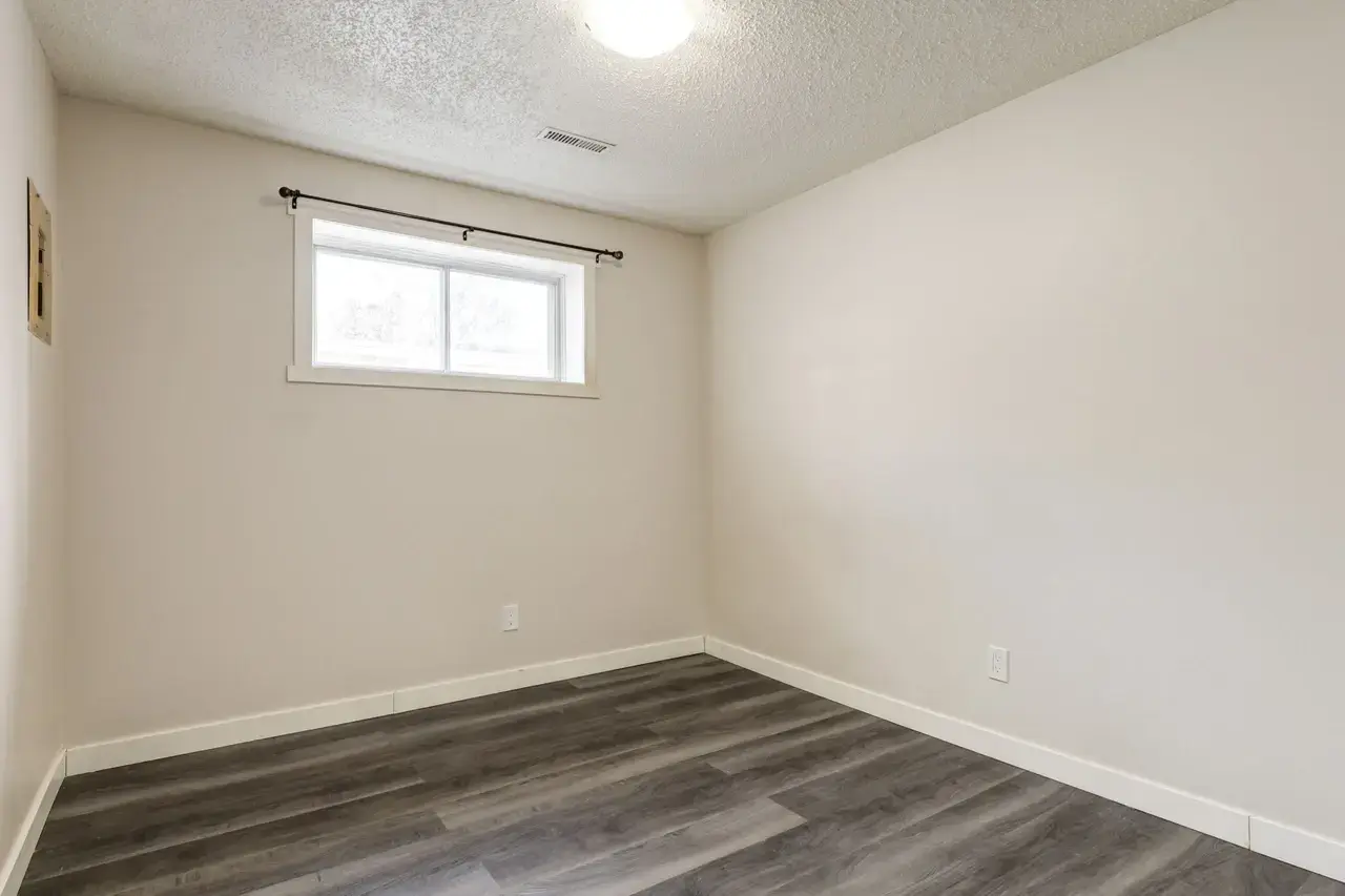 Comfortable and well-sized bedroom at Spruce View Apartments in Camrose.