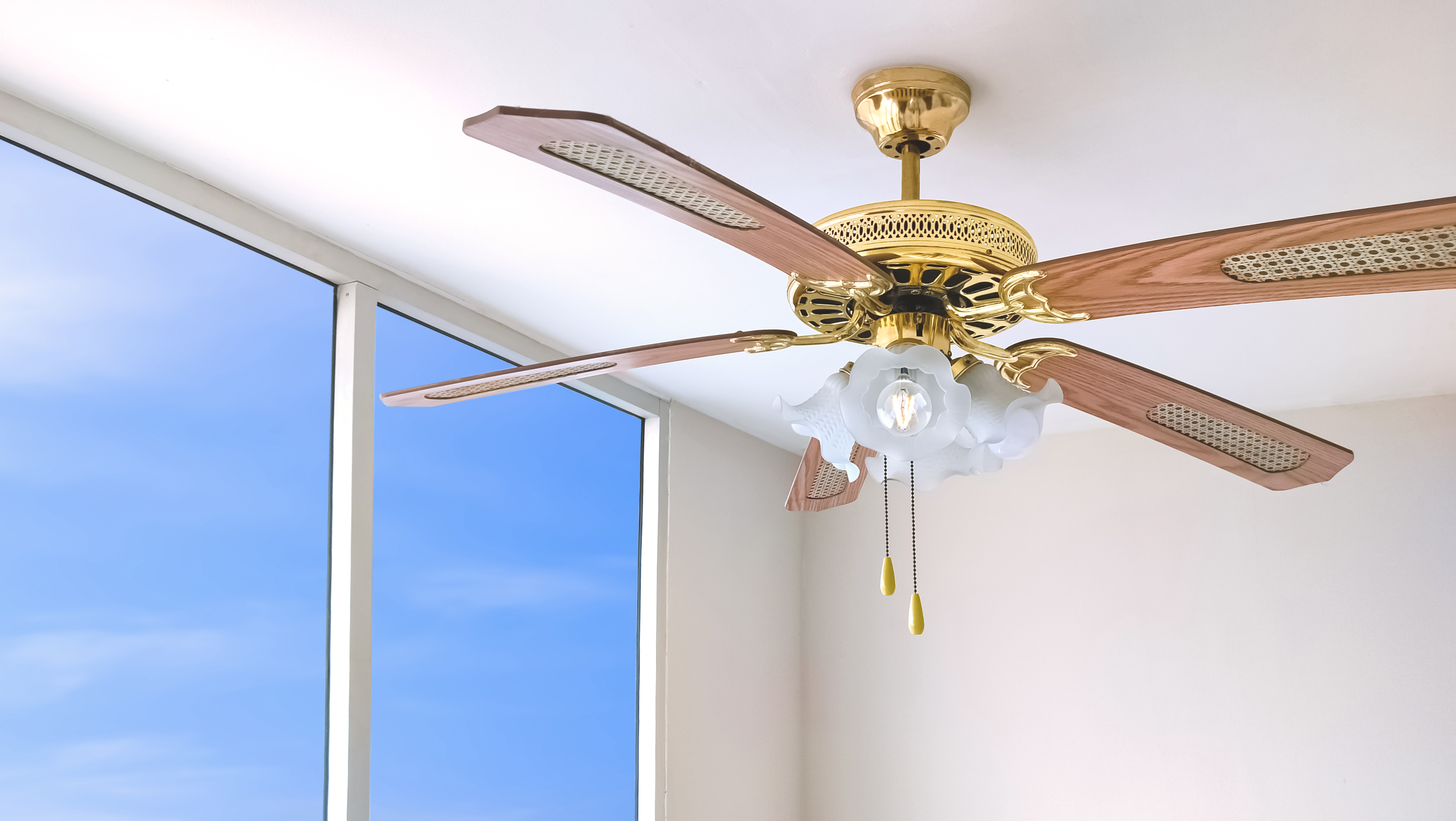 Learn how to reverse your ceiling fan to keep your apartment cool this summer.