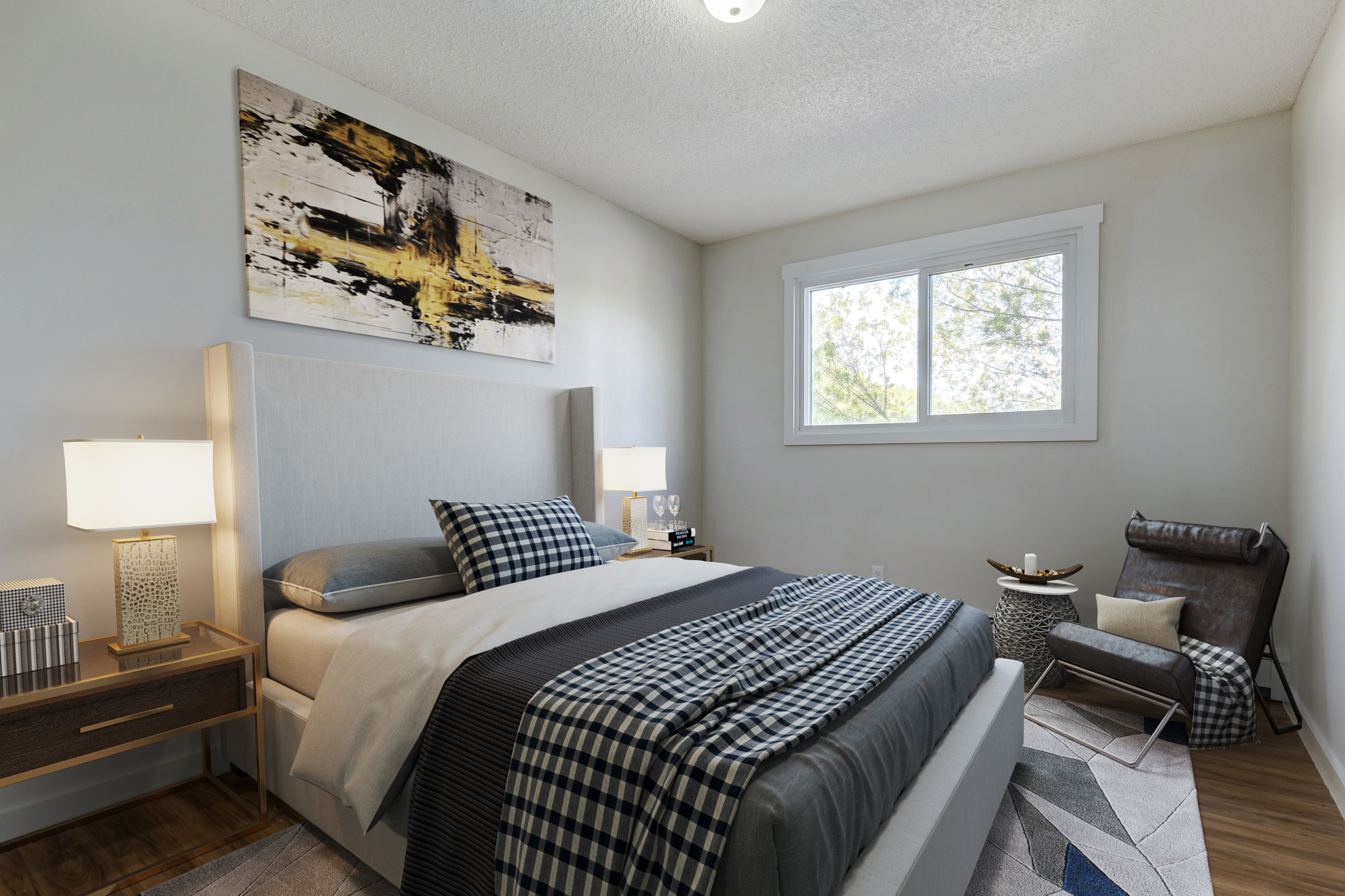 Image of a bedroom inside a Saskatoon apartment.