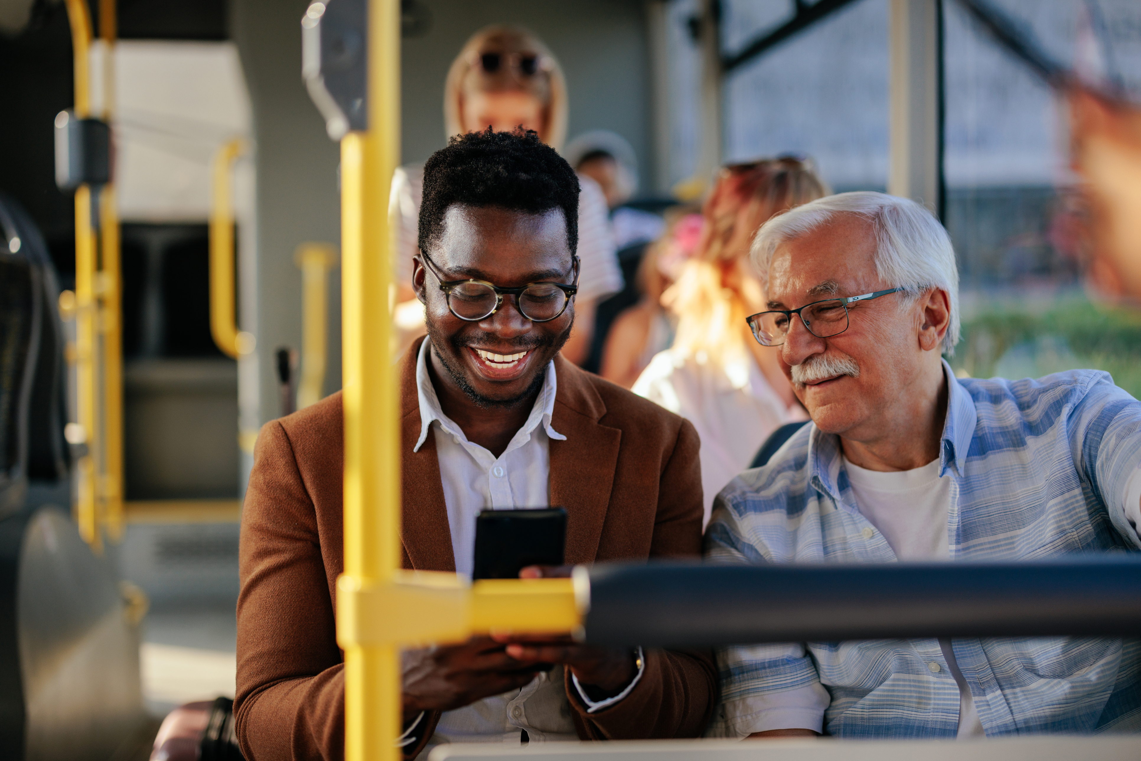 Image of men riding a bus.
