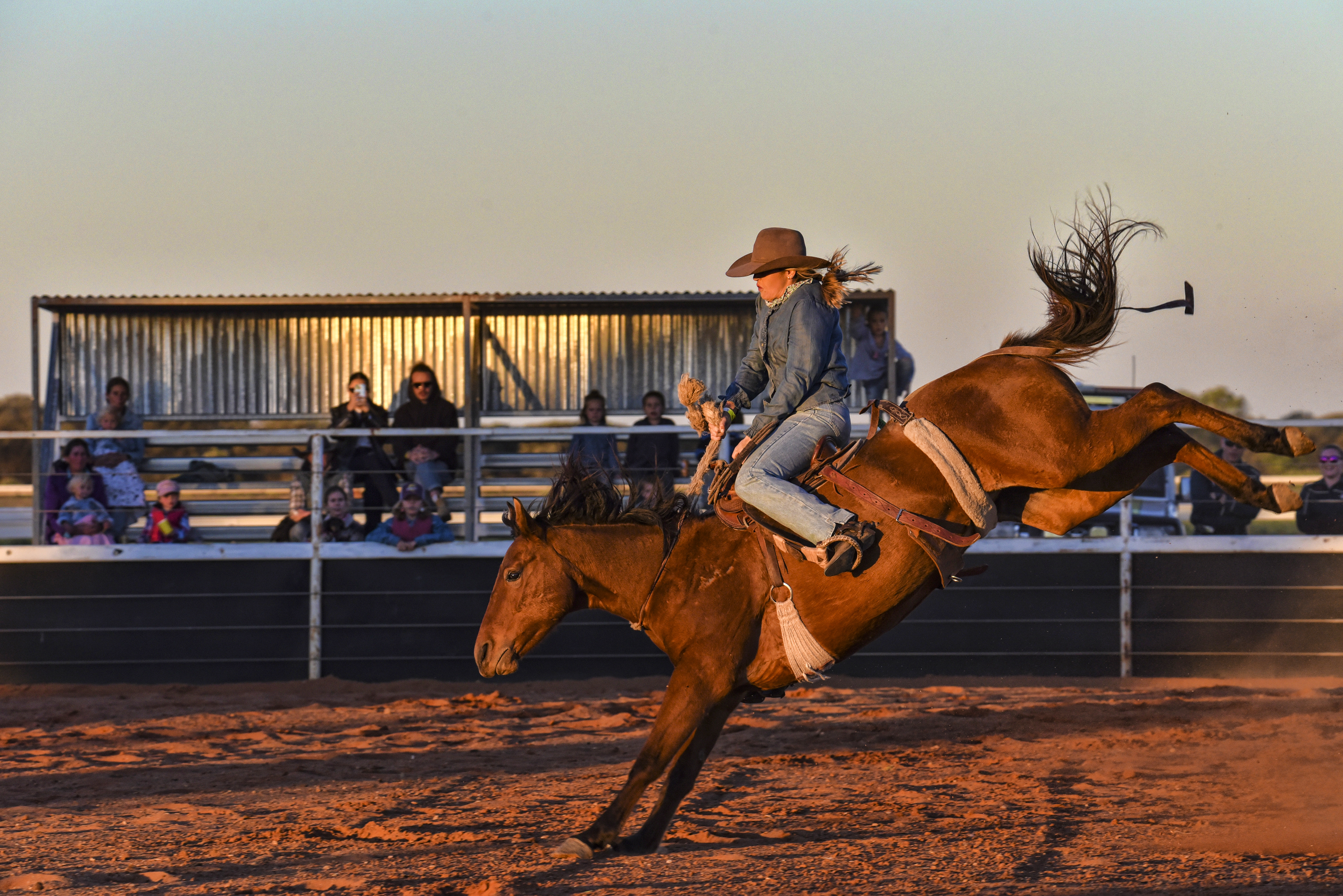 Image of woman riding a horse.