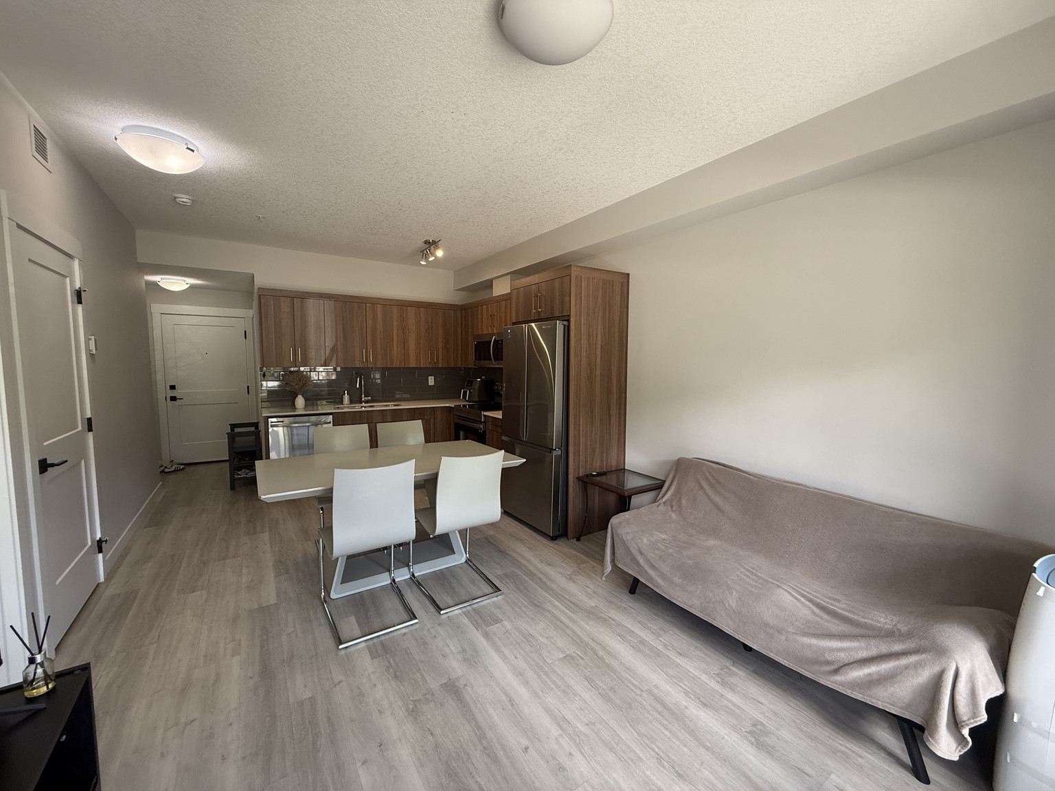 Beautiful Main Floor Condo | 2 Bedrooms + 1 Bath | Bright & Inviting Living Space - Photo 15