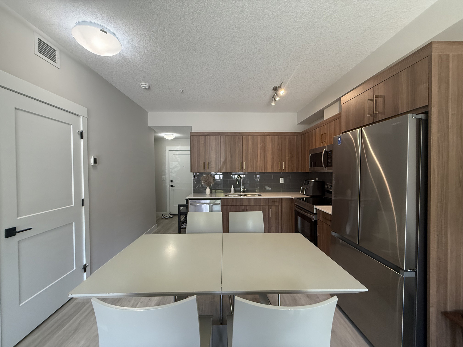 Beautiful Main Floor Condo | 2 Bedrooms + 1 Bath | Bright & Inviting Living Space - Photo 16
