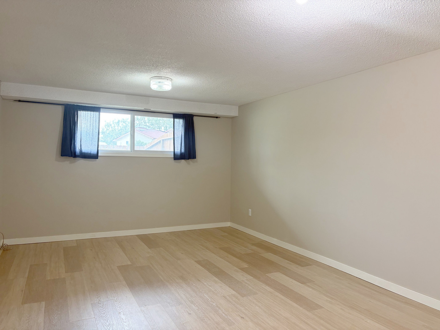 BRIGHT & UPDATED 4 Bed + 2 Bath w/ Rec Room in North Haven NW!  - Photo 15