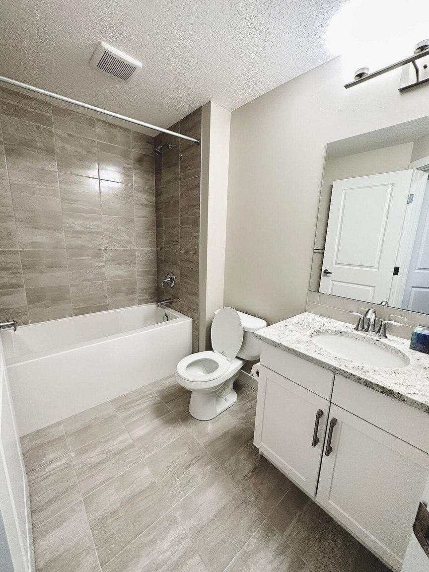 Lower, 109 Evanscrest Road NW - Photo 14