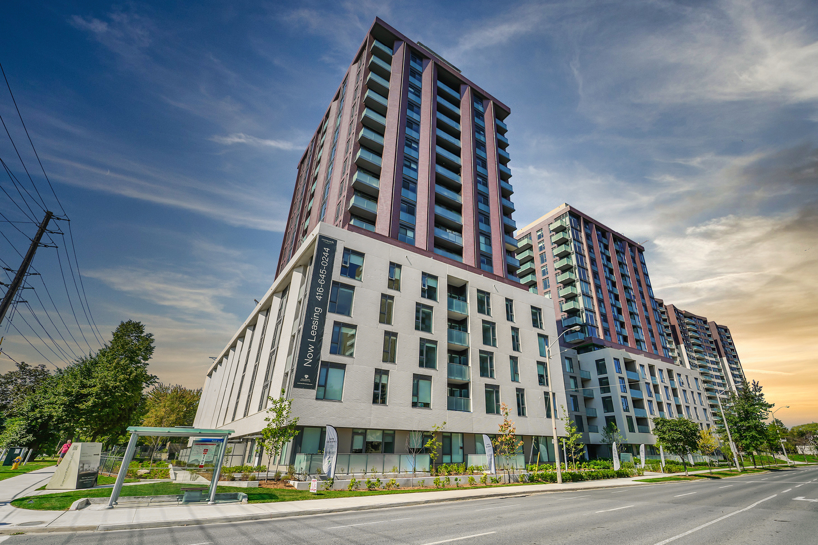 Exterior view of 3030 Pharmacy Avenue, a modern multi-tower rental apartment building in Toronto.