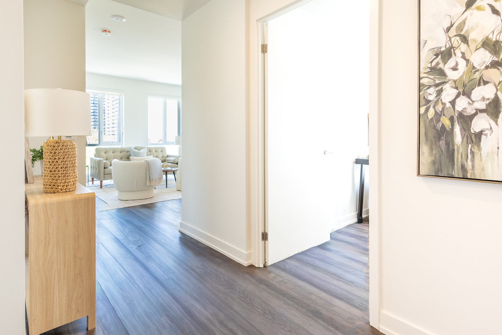 Hallway of a furnished suite leading to the living room at 235 Balliol.