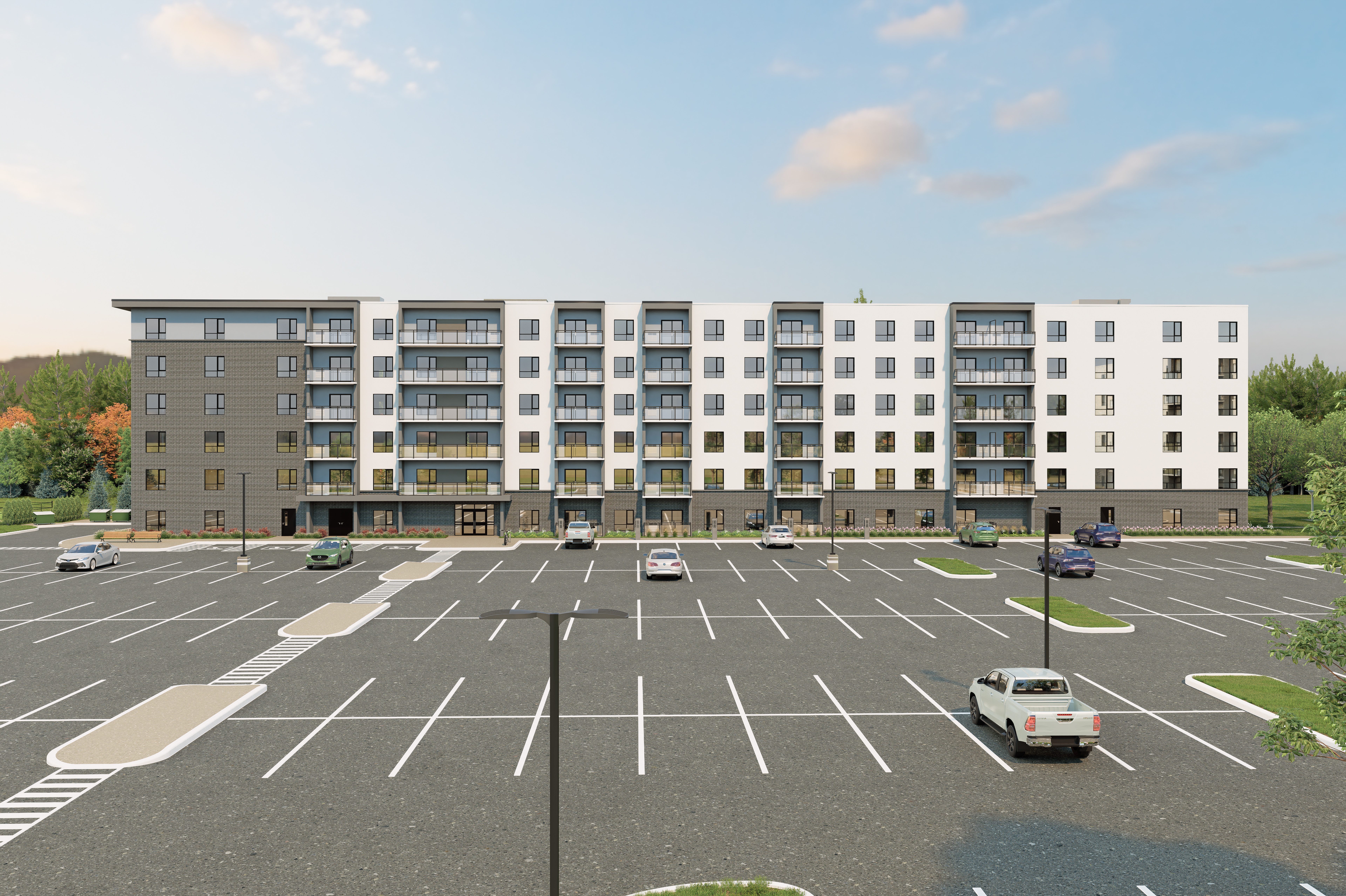 Rendering of Spencer Place Apartments building from the parking lot, showing all of the parking available, with some vehicles parked, and the back of the six-storey building.